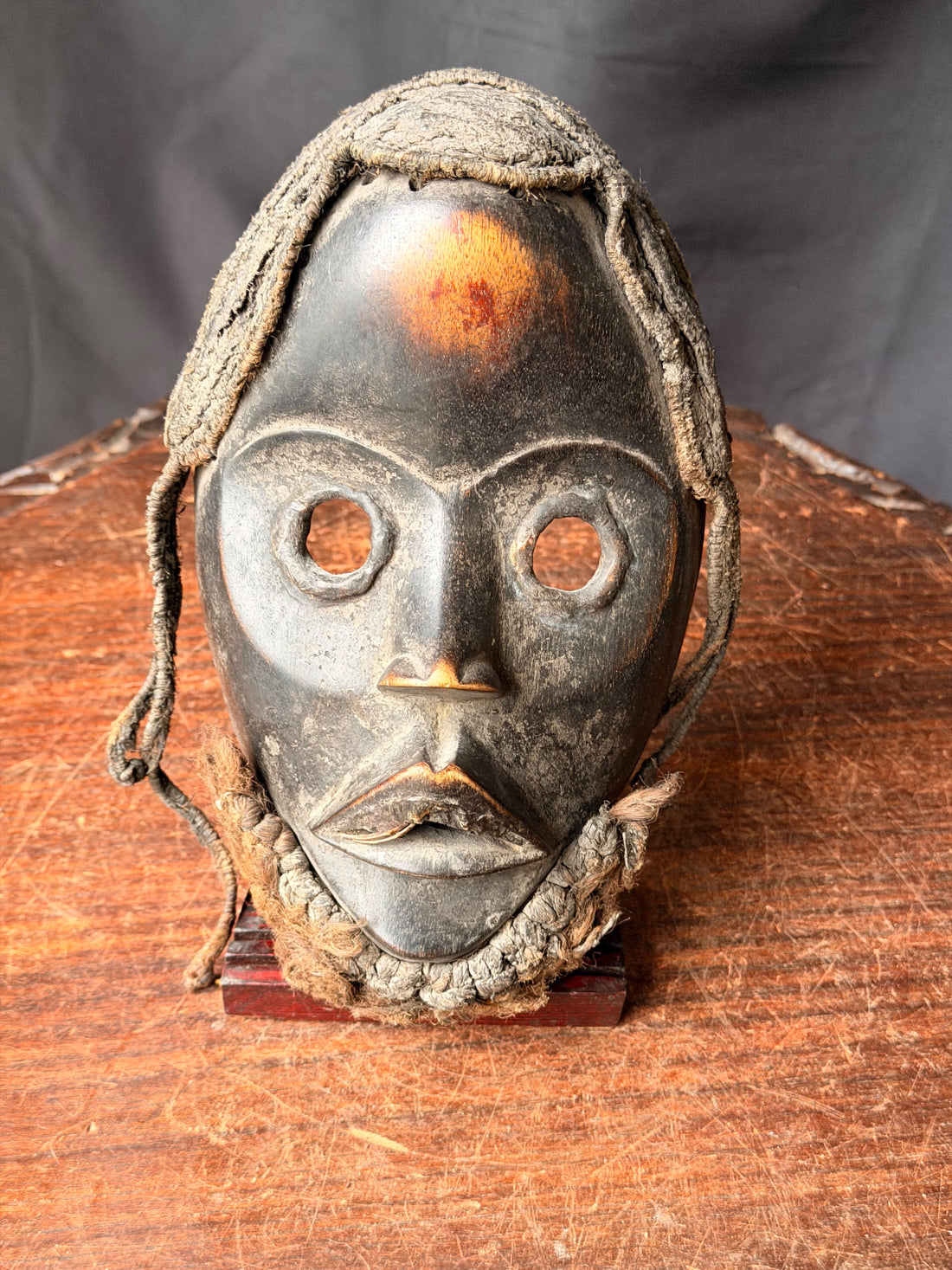Vintage Dan wood mask with braided fiber hair and beard