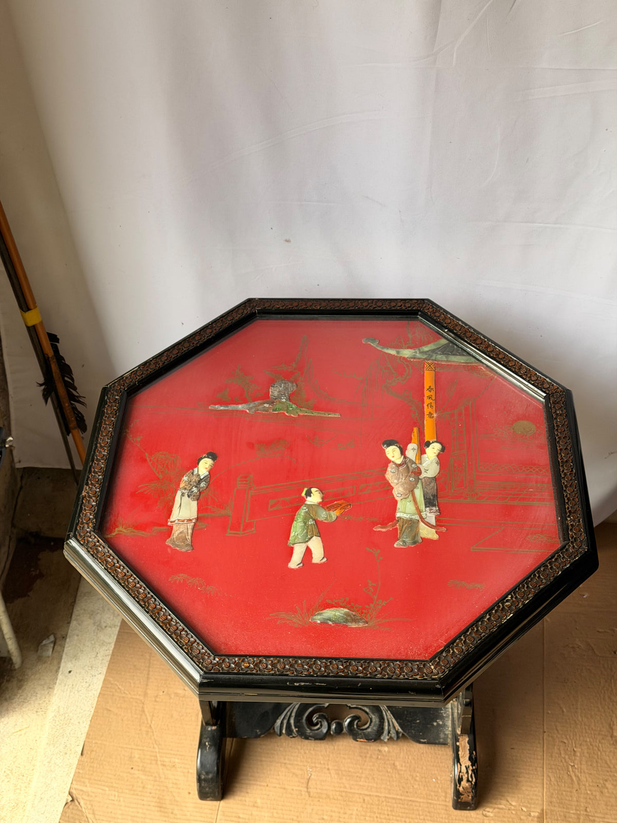Vintage Chinoiserie Red Lacquer Octagonal Tilt Top Table Carved Stone Figures