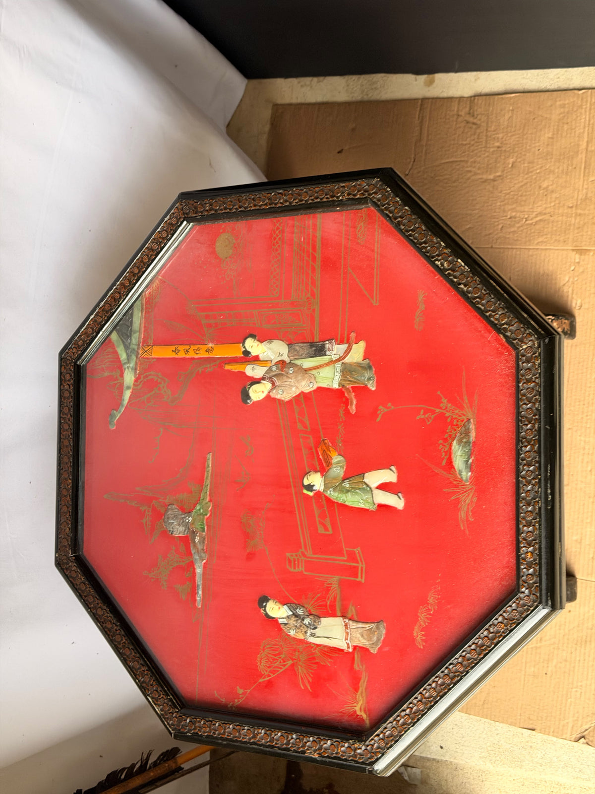 Vintage Chinoiserie Red Lacquer Octagonal Tilt Top Table Carved Stone Figures