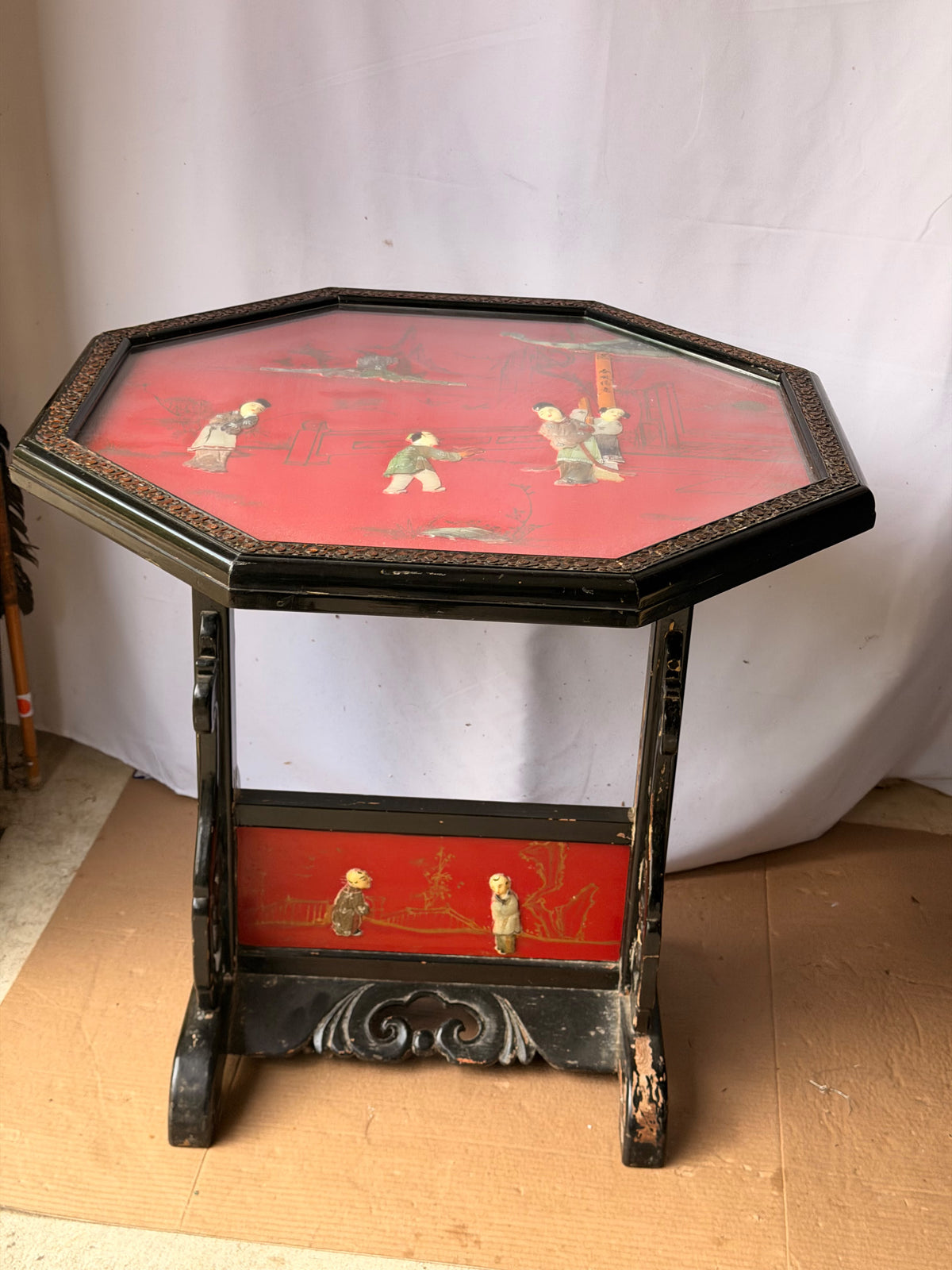 Vintage Chinoiserie Red Lacquer Octagonal Tilt Top Table Carved Stone Figures