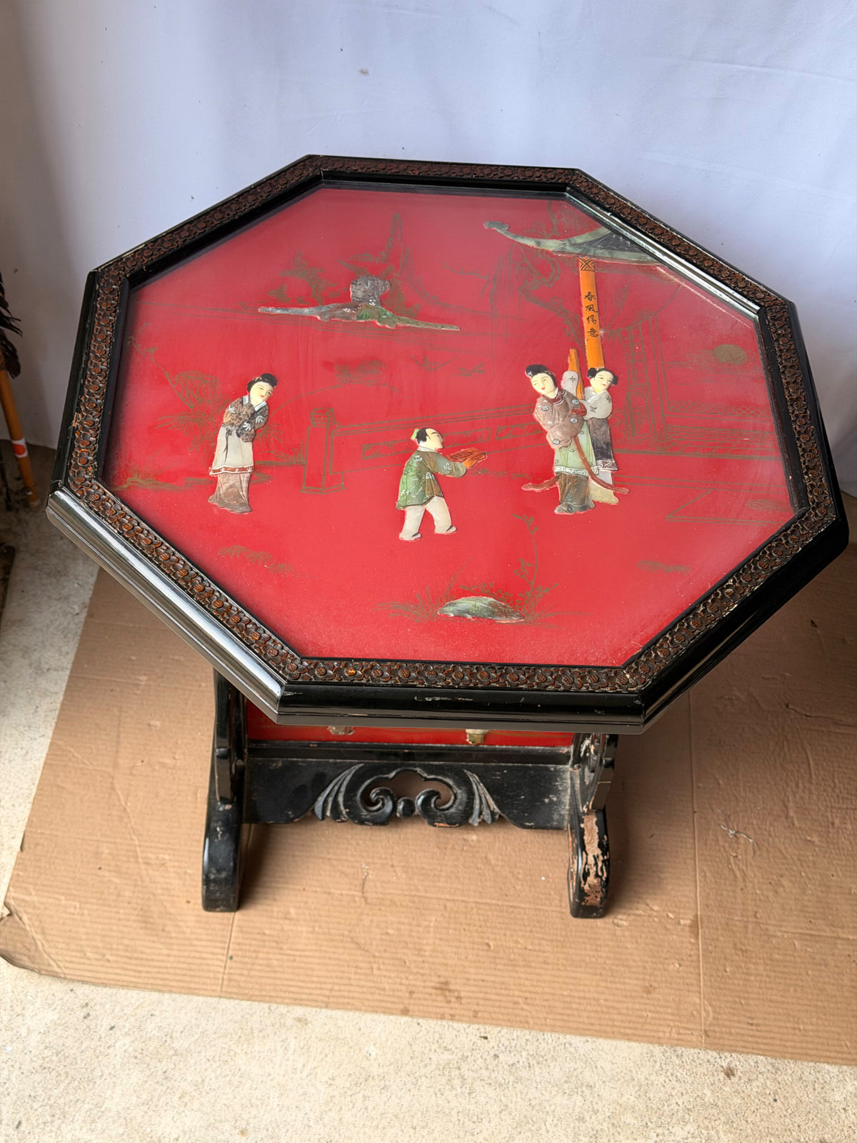 Vintage Chinoiserie Red Lacquer Octagonal Tilt Top Table Carved Stone Figures