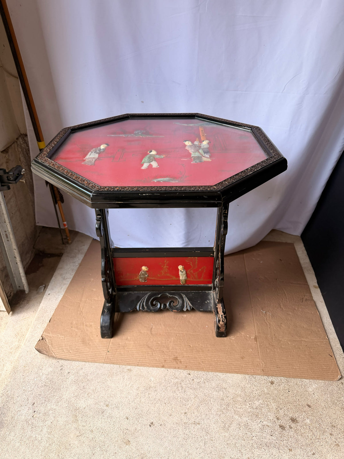 Vintage Chinoiserie Red Lacquer Octagonal Tilt Top Table Carved Stone Figures