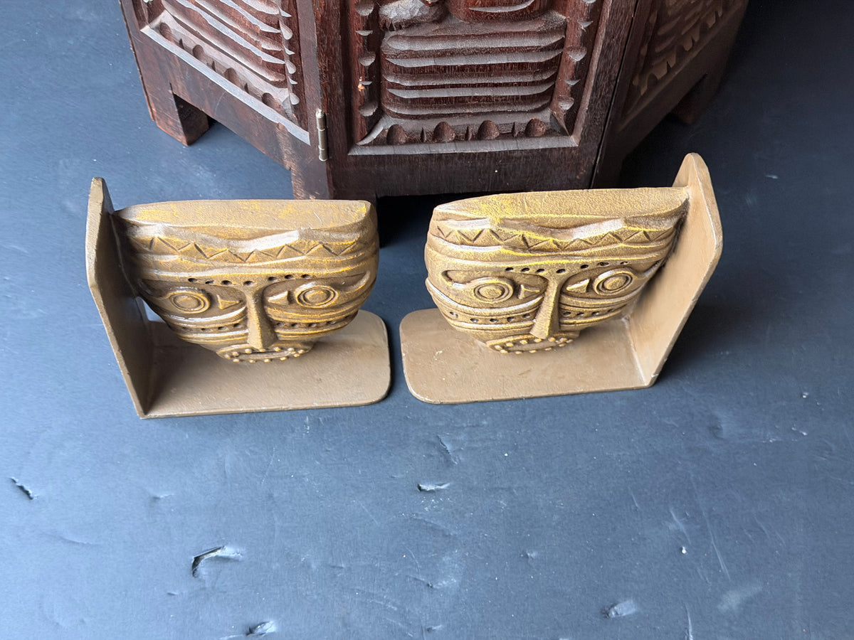 Vintage Tribal Mask Bookends Pair Mid Century Tiki Gold Tone Cast Metal 6.5 in