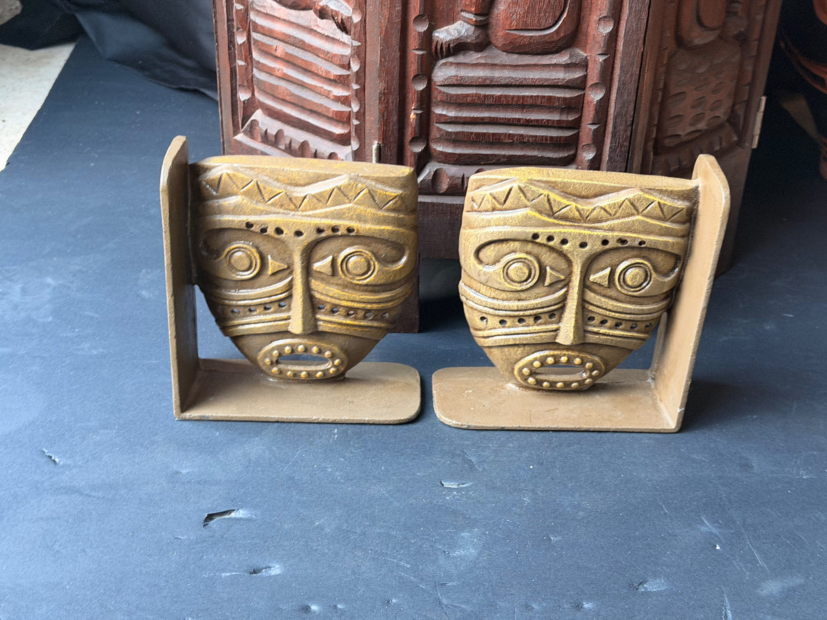 Vintage Tribal Mask Bookends Pair Mid Century Tiki Gold Tone Cast Metal 6.5 in