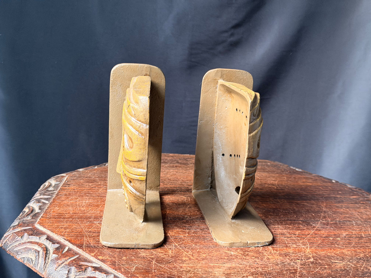 Vintage Tribal Mask Bookends Pair Mid Century Tiki Gold Tone Cast Metal 6.5 in