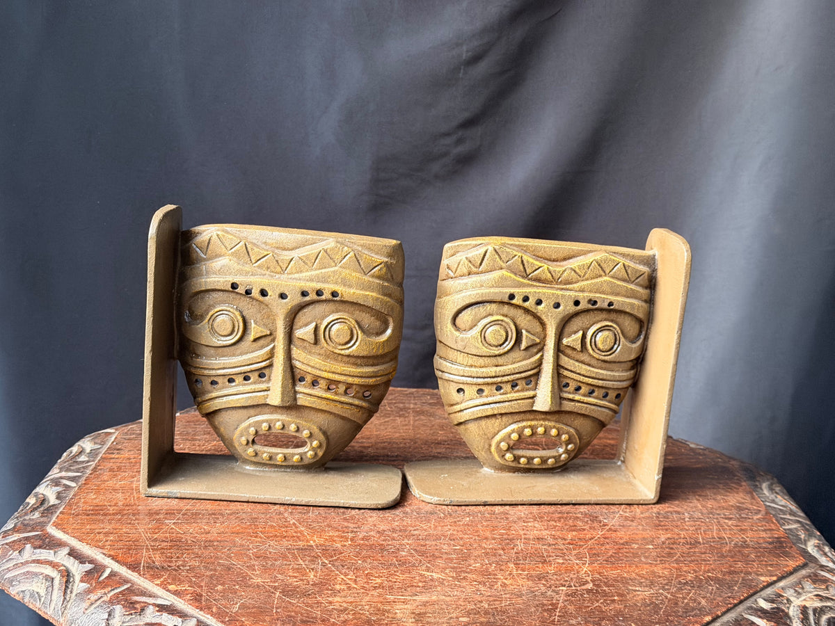 Vintage Tribal Mask Bookends Pair Mid Century Tiki Gold Tone Cast Metal 6.5 in