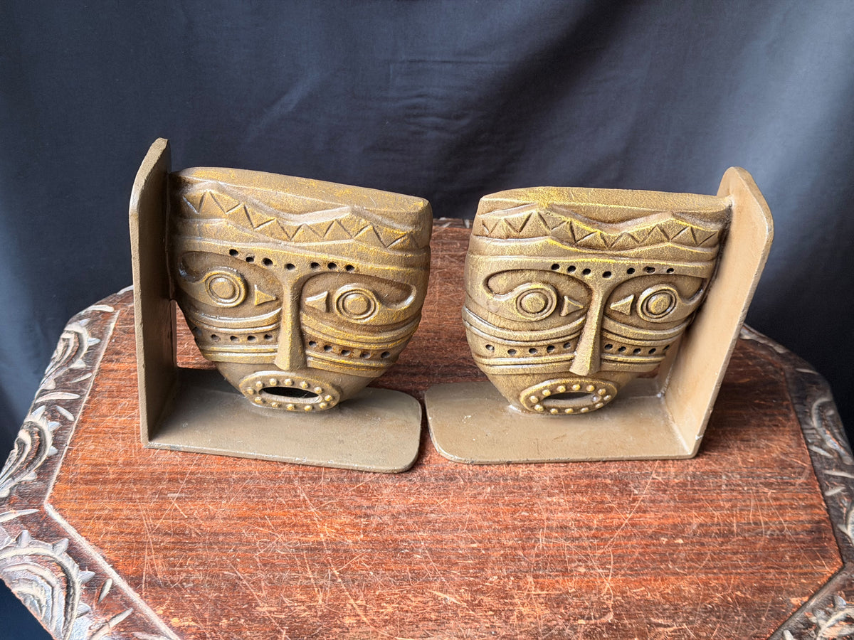 Vintage Tribal Mask Bookends Pair Mid Century Tiki Gold Tone Cast Metal 6.5 in