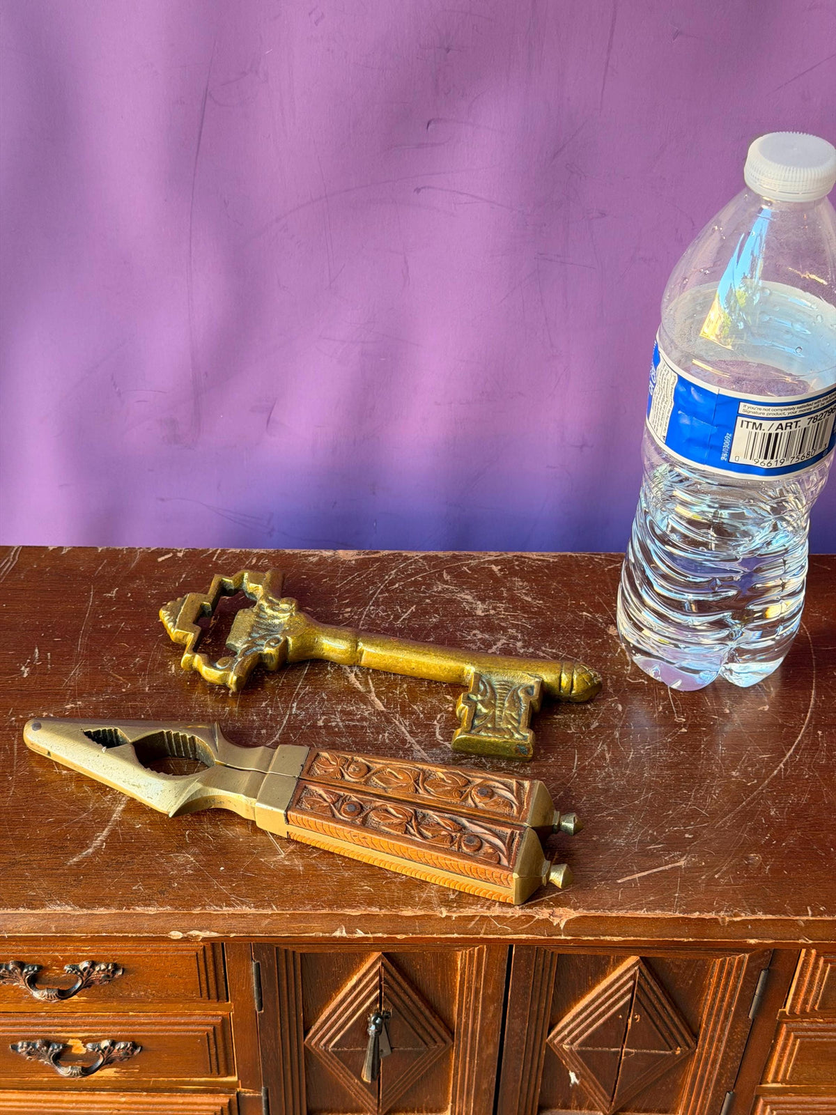 Vintage Indian Brass Key Bottle Opener and Carved Wood Nutcracker Set