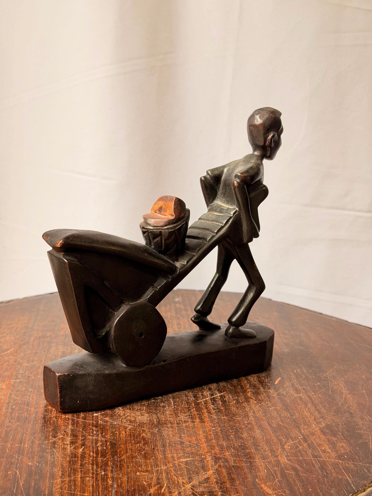 Vintage Carved Wood Man Pushing Cart Sculpture Wheelbarrow Labor Statue 8"