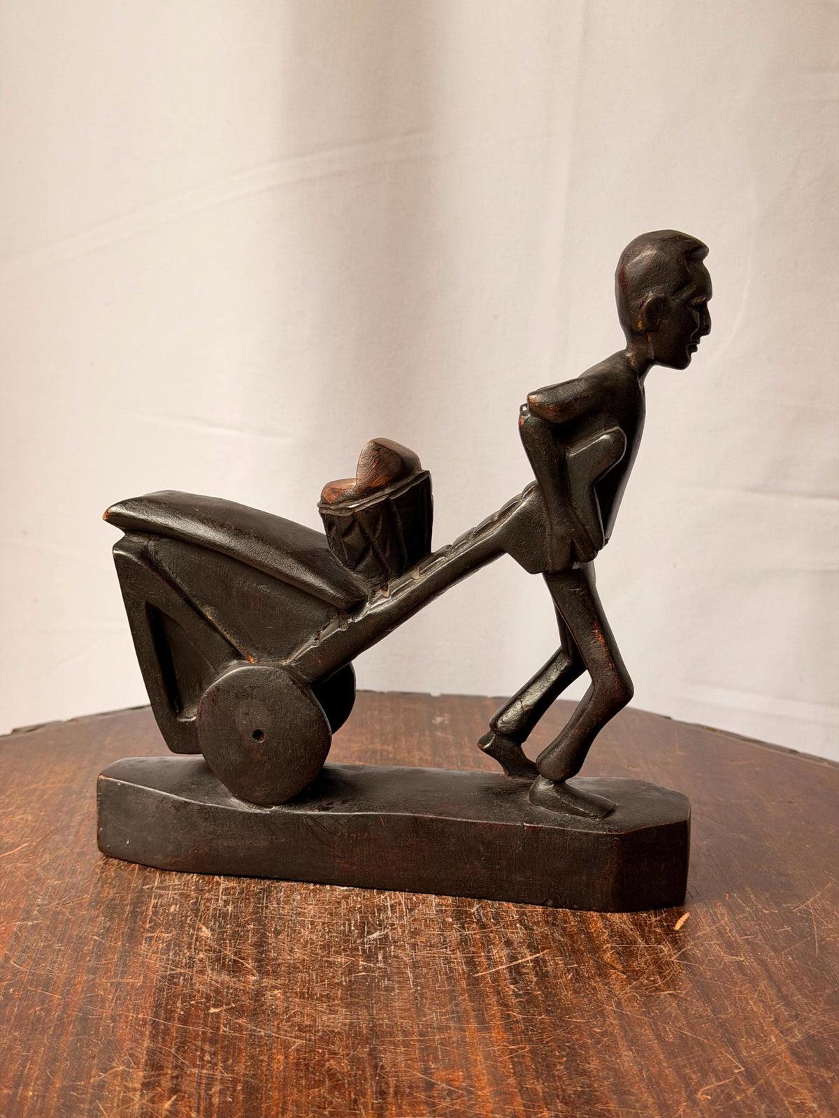 Vintage Carved Wood Man Pushing Cart Sculpture Wheelbarrow Labor Statue 8"